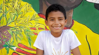 Niño sonríe en Pondores, La Guajira (Colombia)
