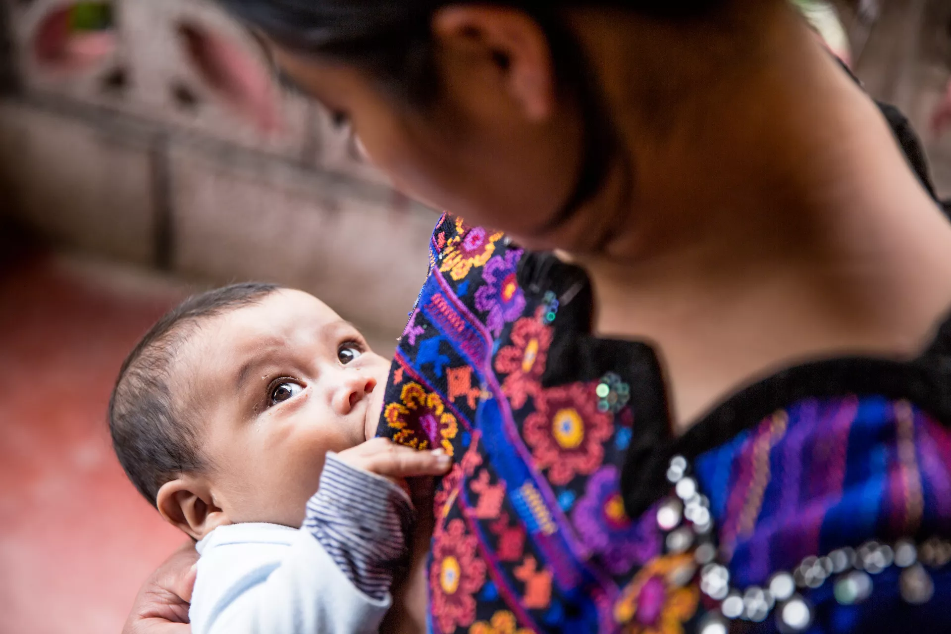 On October 16, 2019, Eva Ramírez a woman of the community of Chicoy, Todos Santos, Huehuetenango, Guatemala is breastfeeding her son, Junior Chales Ramírez (16 months old).