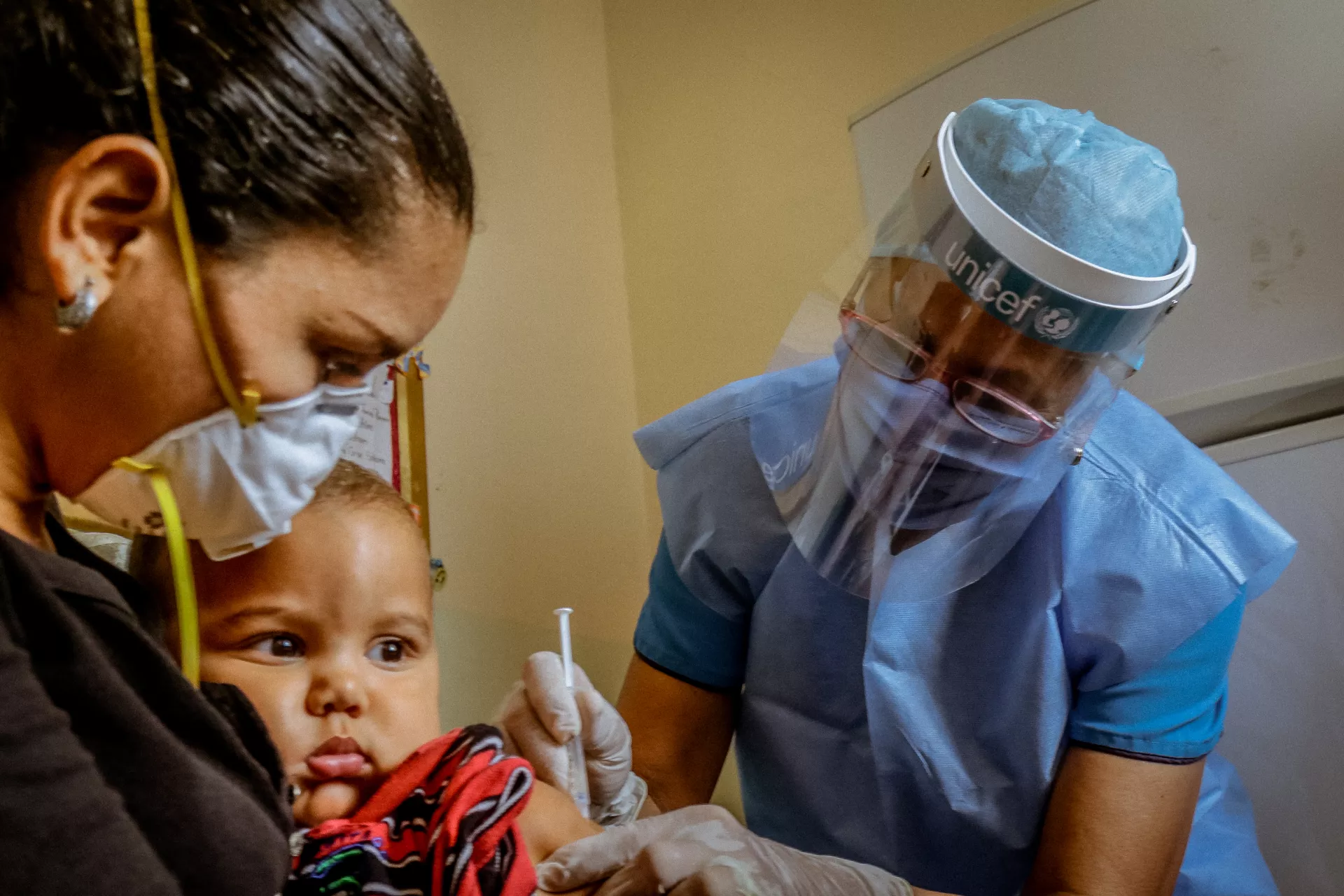 A one-year-old boy is vaccinated in Venezuela in 2020.