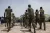 Children in uniform march in lines, South Sudan