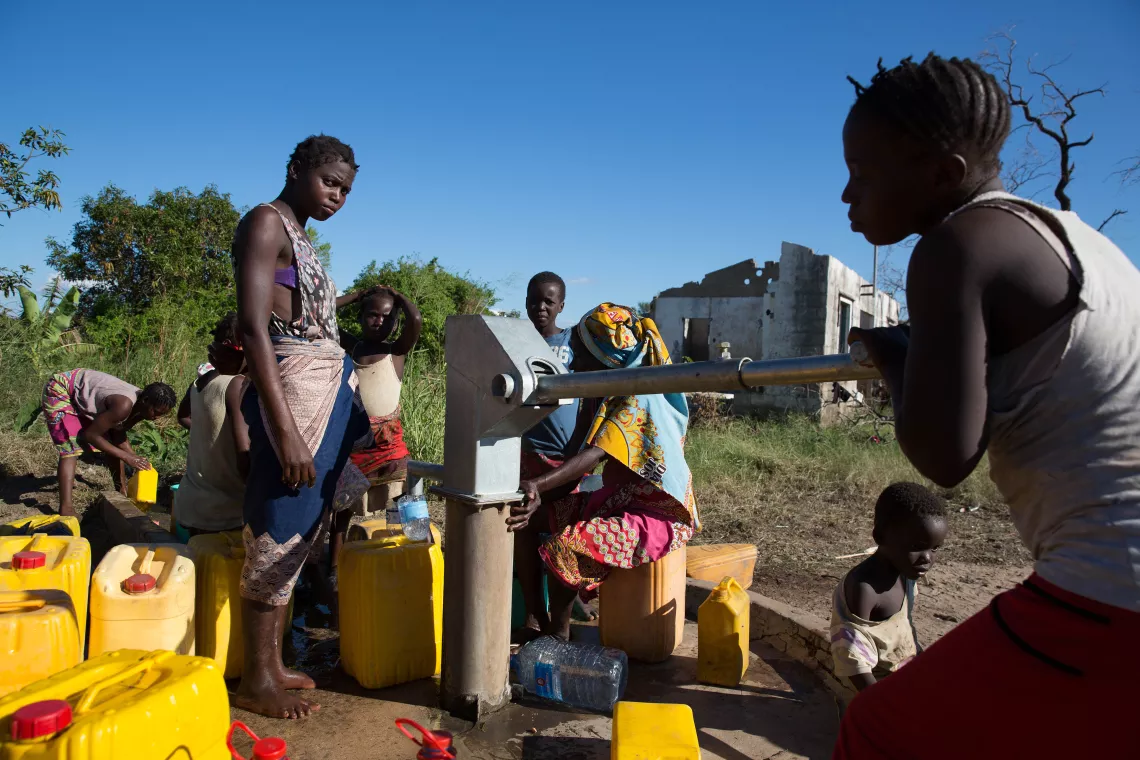 Mozambique. Water starts flowing from a pump at an accommodation centre for people displaced by Cyclone Idai.