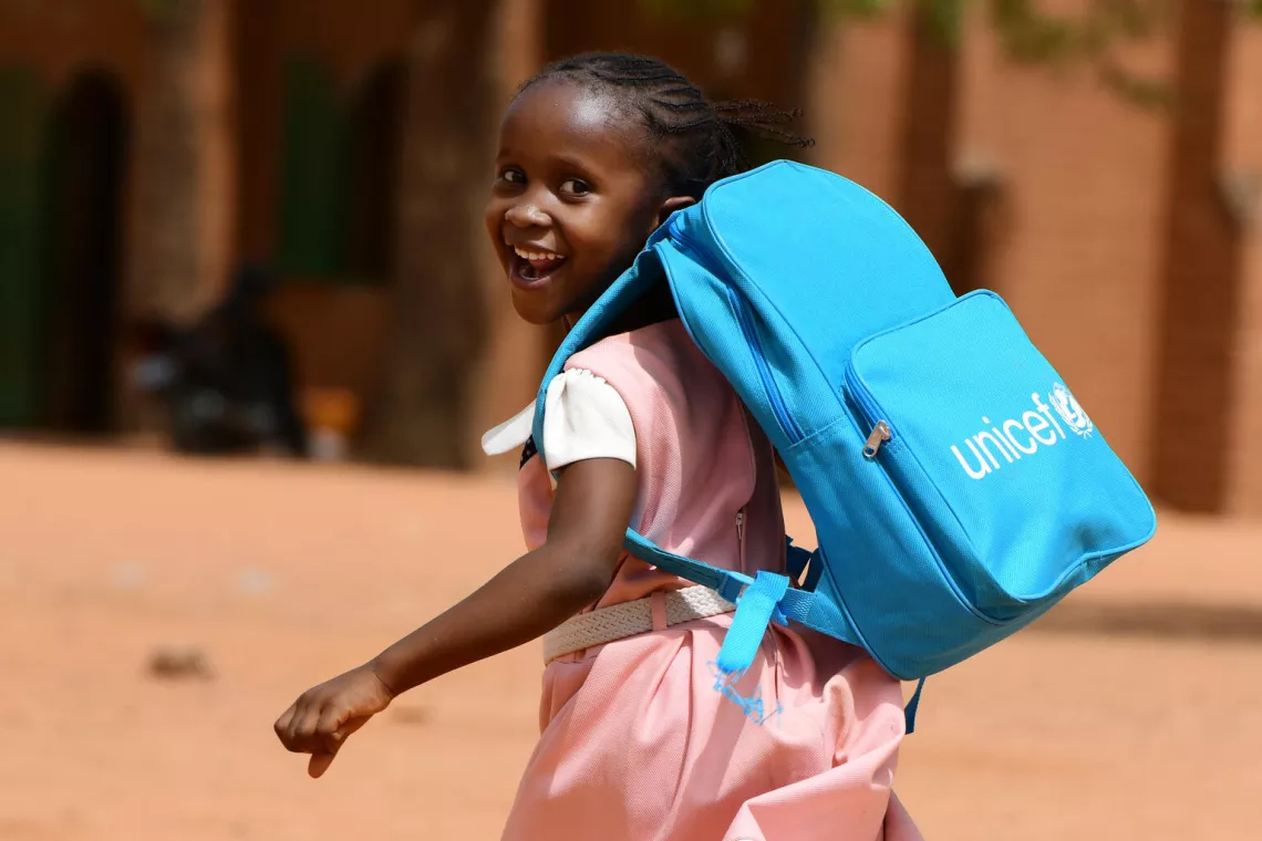 A girl at school in Niamey, the capital of Niger, with her UNICEF backpack.